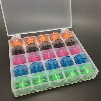 25 coloured bobbins in a box