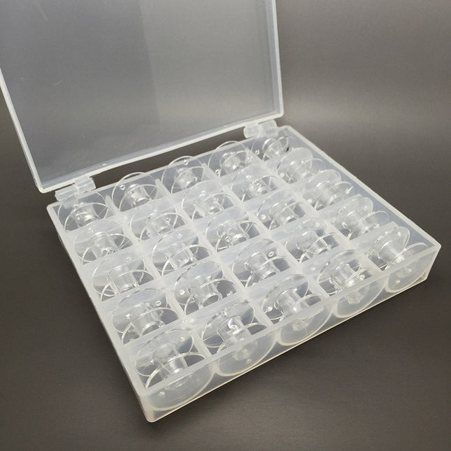 25 Clear bobbins in a box - image 2